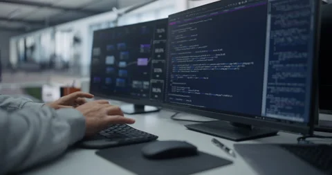 Programmer Writing Code on Computer Video stock 296184770