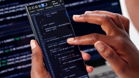 Programmer Writing Code On Laptop And Phone Stock Footage 312892941