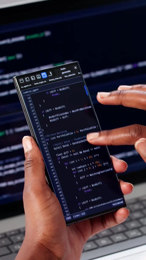 Programmer Writing Code On Laptop And Phone Video stock 313359143