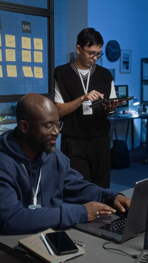 Programmer Writing Code on Laptop, Project Manager Using Digital Tablet Stock Footage 329616623