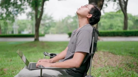 Programmer is writing code, typing on laptop keyboard Stock Footage 283186617