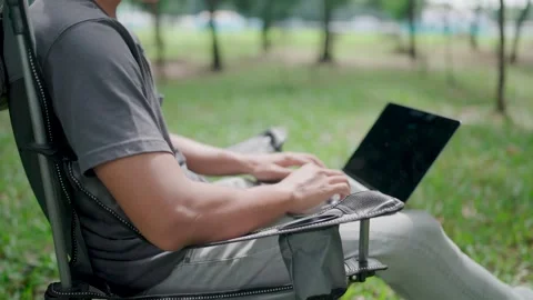 Programmer is writing code.Development, graph analysis and typing on a laptop Stock Footage 283186575