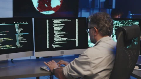 Programmer Writing Codes on Computer Stock Footage 232020316