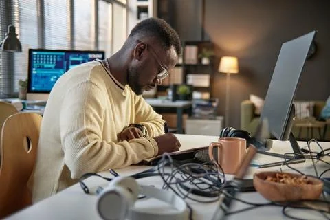 Programmer Writing down Ideas 스톡 사진