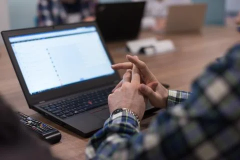 Programmer writing programming code Stockfoto's