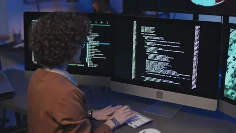 Programmer Writing Security Codes on Computer Stock Footage 232022890