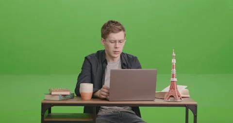 Programmer young man work. Green screen. 4K Stock-Footage 170000117