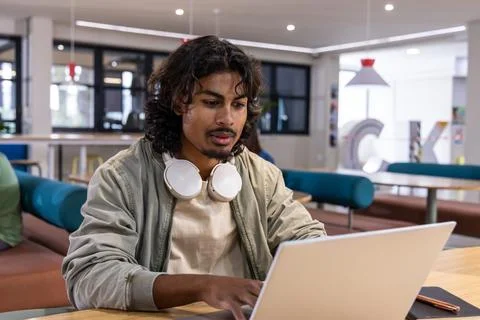 Programmers and CS students chuckling while reading short computer science jokes Stock Photos