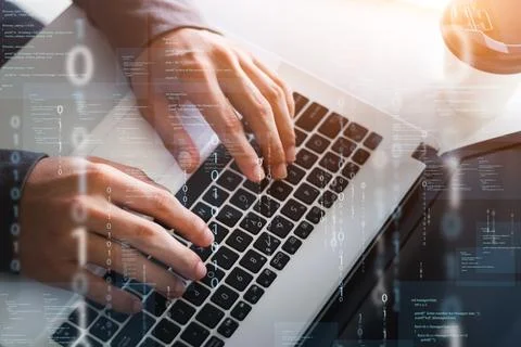 Programmers and cyber security technologies design websites and security in.. Stock Photos