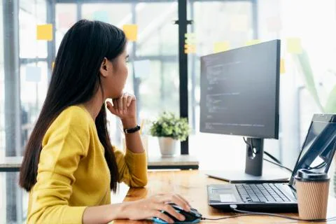 Programmers and developer teams are coding and developing software Stockfoto's