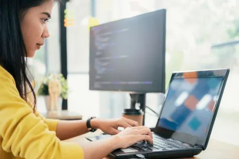 Programmers and developer teams are coding and developing software 스톡 사진