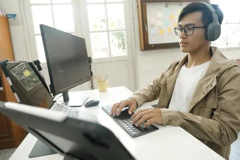 Programmers and developer teams are coding and developing software 写真素材