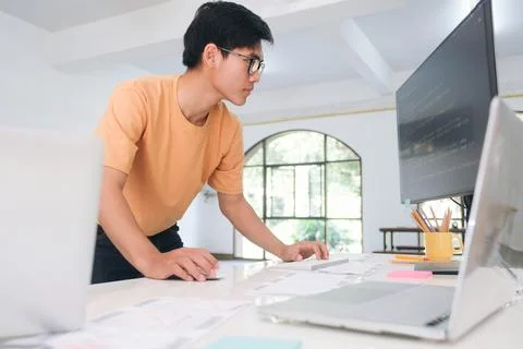 Programmers and developer teams are coding and developing software 写真素材