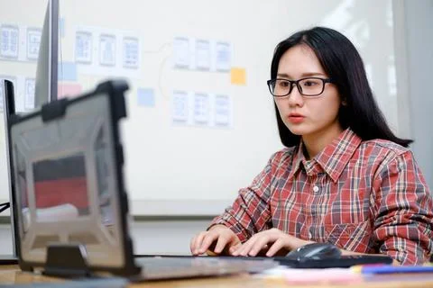 Programmers and developer teams are coding and developing software 写真素材