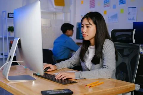 Programmers and developer teams are coding and developing software 写真素材