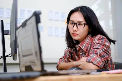 Programmers and developer teams are coding and developing software Stock Photos