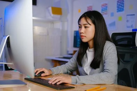 Programmers and developer teams are coding and developing software Stock Photos