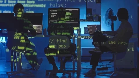 Programmers Coding Late at Night in Modern Office Stock Footage 320090911