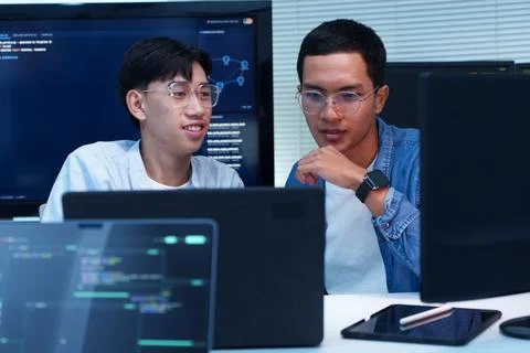 Programmers Collaborating on Digital Software Development Stock Photos