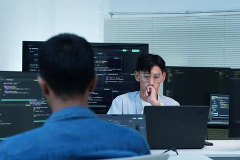 Programmers Collaborating on Software Development and Digital Technology Stock Photos