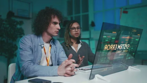 Programmers confront system failure on futuristic interface with visible bugs Stock Footage 333195111