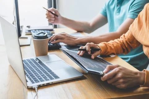 Programmers cooperating at Developing programming and website working in a so Stock-Fotos