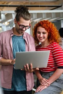 Programmers cooperating at IT company developing apps. People business work Stock-Fotos