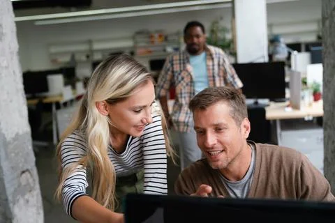 Programmers cooperating at IT company developing apps. Business people Stock Photos