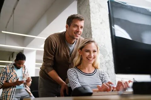 Programmers cooperating at IT company developing apps. People business work Stock Photos