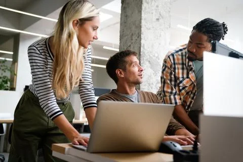 Programmers cooperating at IT company developing apps. People business work Foto stock