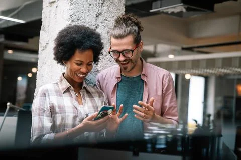 Programmers cooperating at IT company developing apps. People business work Stock Photos