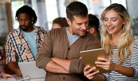 Programmers cooperating at IT company developing apps. People business work Stock-Fotos
