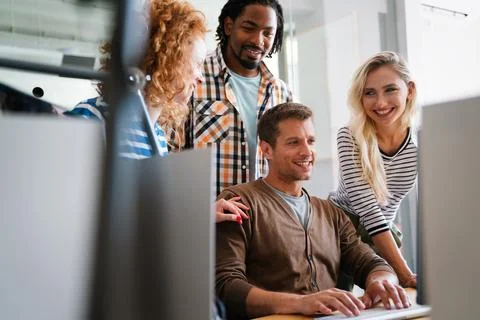 Programmers cooperating at IT company developing apps. Business people tech.. 스톡 사진