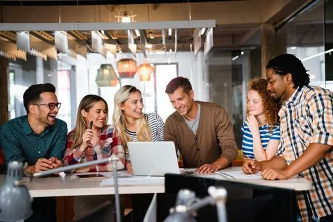 Programmers cooperating at IT company developing apps. Business people tech.. Stock Photos