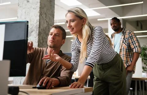 Programmers cooperating at IT company developing apps. People business work.. Stock Photos