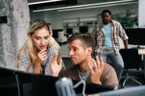 Programmers cooperating at IT company developing apps. People business work.. Stock-Fotos
