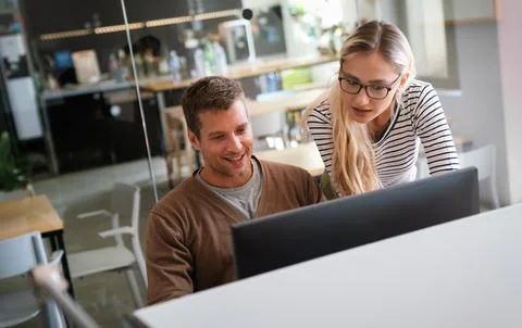 Programmers cooperating at IT company developing apps. People business work.. Stock Photos