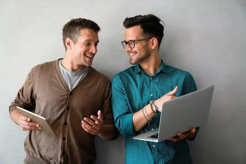 Programmers cooperating at IT company developing apps. People business work.. Stock Photos