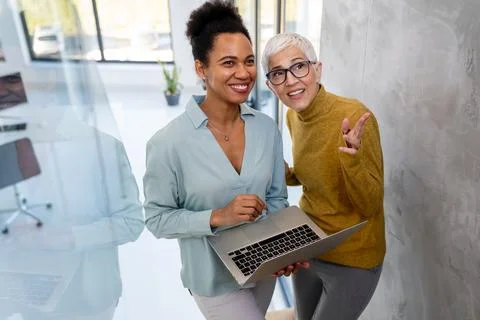 Programmers cooperating at IT company developing apps. People business work Stock Photos