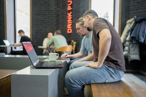 Programmers cooperating at IT company developing apps. People business work Stock Photos