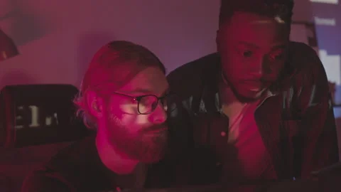 Programmers Coworking at Night Stock Footage 165725791