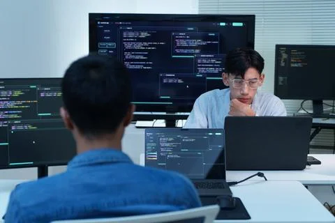 Programmers Developing Digital Software with AI Code Foto stock