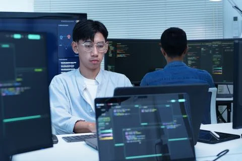 Programmers Developing Digital Software and AI Technology Stock Photos