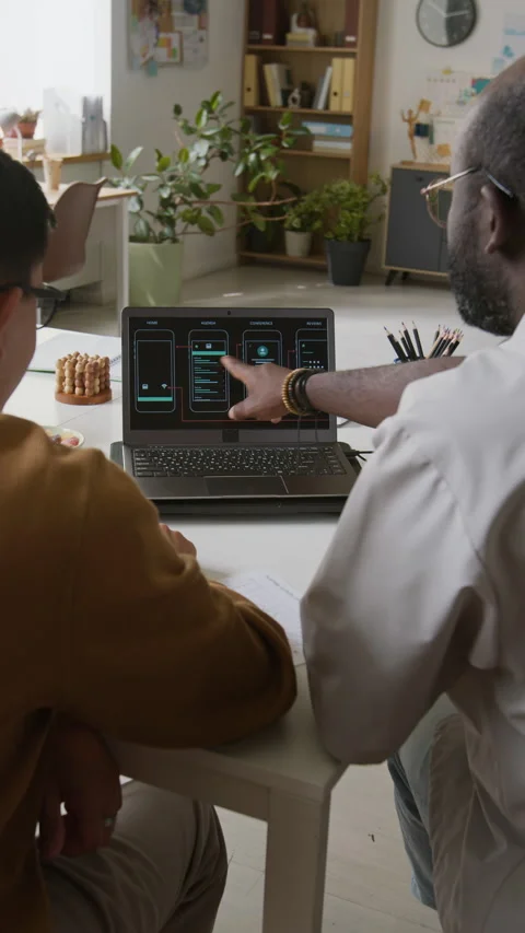 Programmers Discussing New Project Stock-Footage 317344925