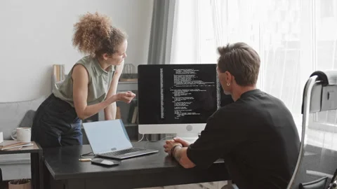 Programmers Discussing Program Coding Stock Footage 171537789