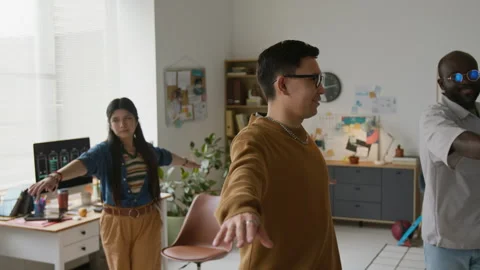 Programmers Doing Exercises during Workday Video stock 317338212