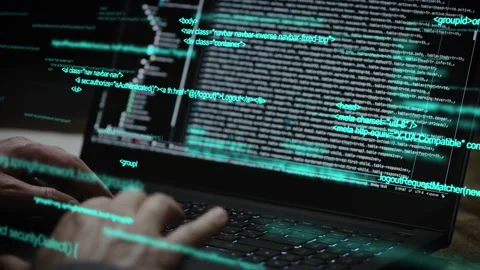 Programmer's hands and laptop keyboard close-up. The developer writes the Stock Footage 177310664