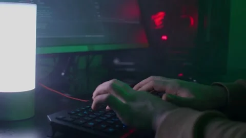 The programmer's hands quickly type on the keyboard, coding, developing Stock Footage 147605343