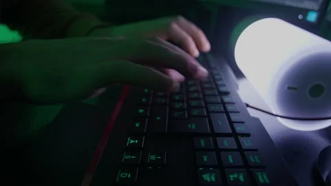 The programmer's hands quickly type on the keyboard, coding, programming Stock Footage 147606121