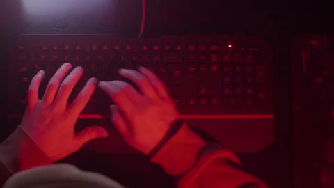 The programmer's hands quickly type on the keyboard, coding, programming, gaming Stock Footage 147668856